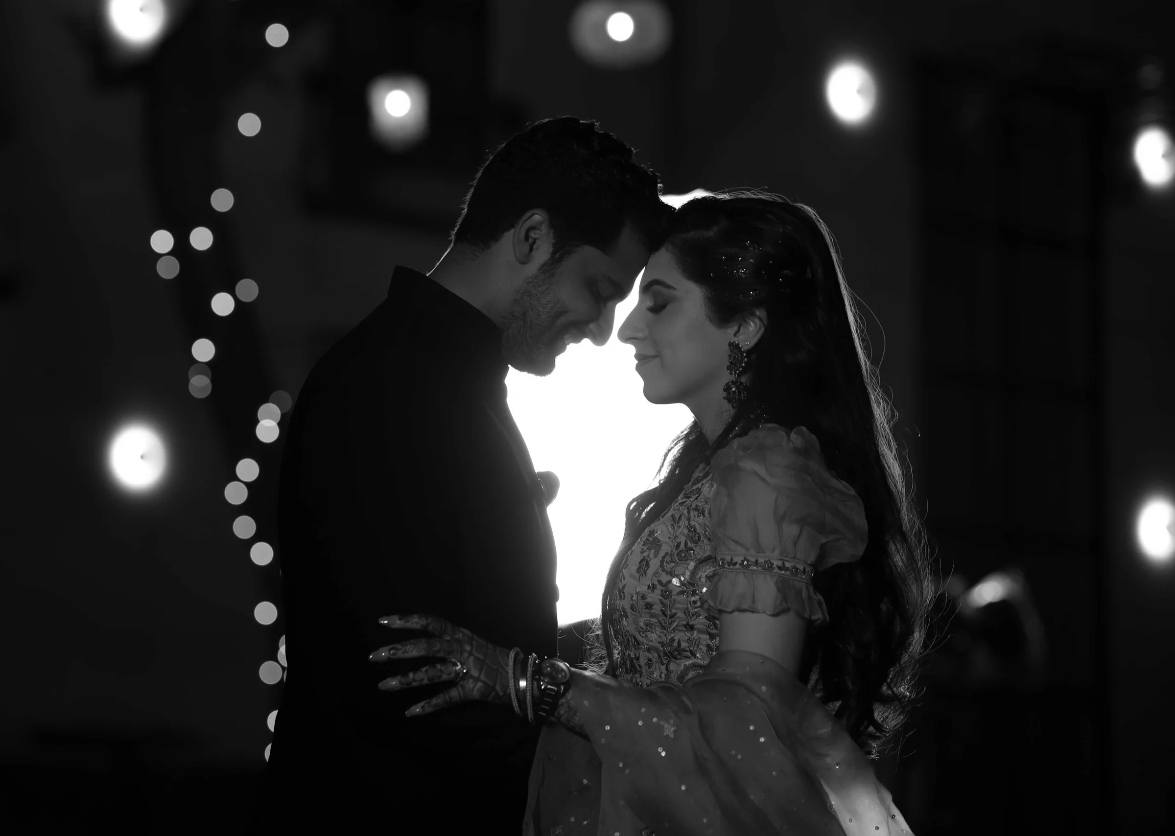 Couple sharing an intimate moment in black and white