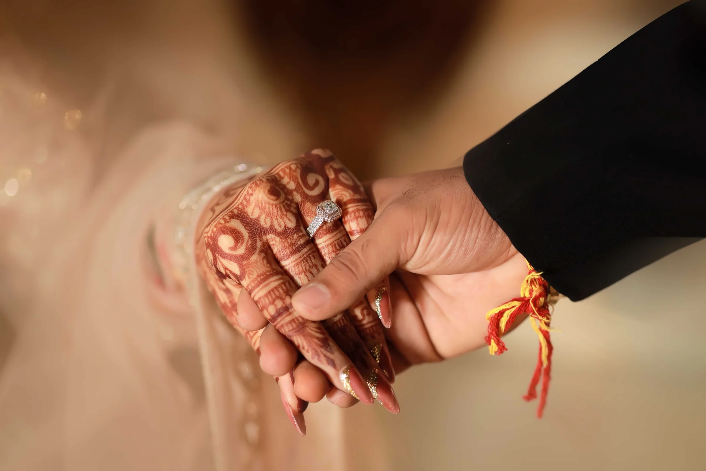 Bride and groom holding hands